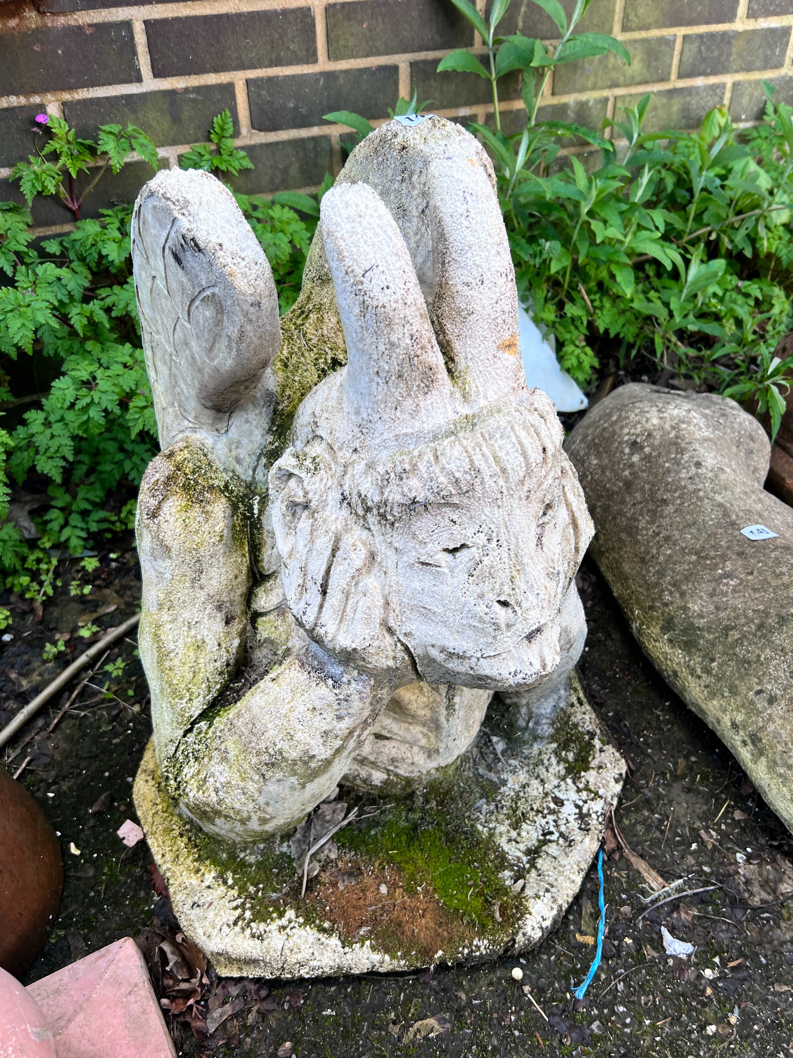 A reconstituted stone gargoyle ornament, height 56cm *Please note the sale commences at 9am.